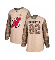 Men's New Jersey Devils #82 Nikita Okhotyuk Authentic Camo Veterans Day Practice Hockey Jersey