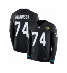Youth Nike Jacksonville Jaguars #74 Cam Robinson Limited Black Therma Long Sleeve NFL Jersey